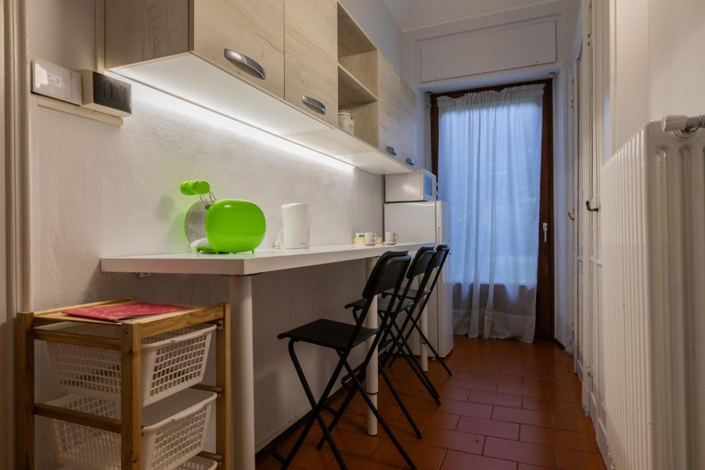 Kuchyňa alebo kuchynka v ubytovaní Spazioso appartamento nei pressi del Po by Wonderful Italy