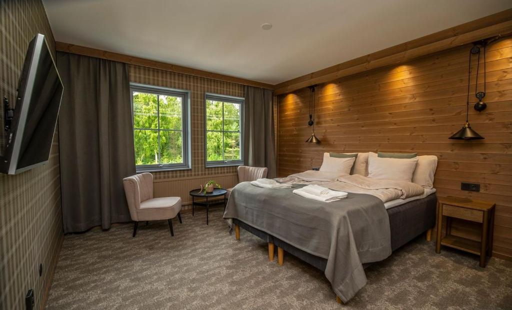 Postel nebo postele na pokoji v ubytování Matarengi Lodge