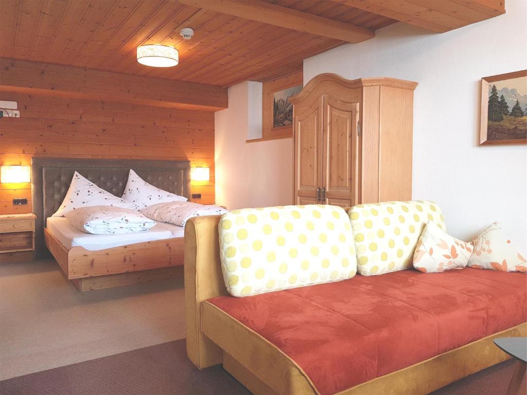 Postel nebo postele na pokoji v ubytování Appartement im Dorf
