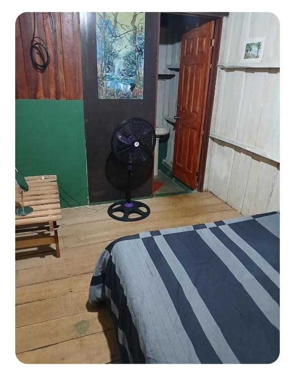 Postel nebo postele na pokoji v ubytování Casa Osa Bella Cabina Rayo Verde