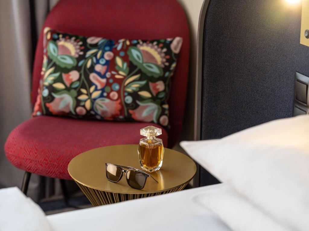Łóżko lub łóżka w pokoju w obiekcie Hotel Mercure Wien City