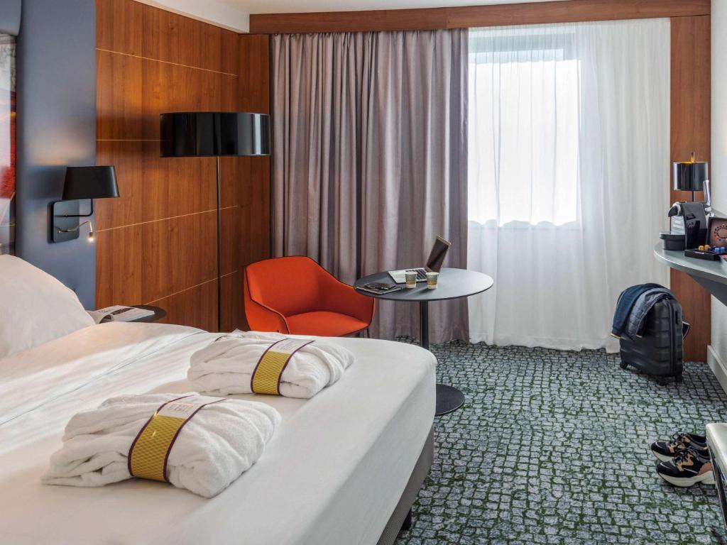 Postel nebo postele na pokoji v ubytování Hotel Mercure Toulouse Centre Compans