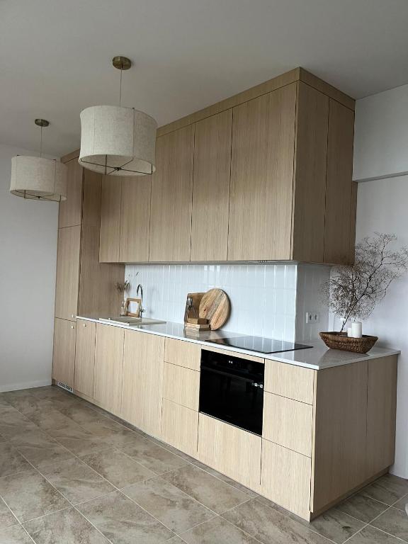 Kuchyň nebo kuchyňský kout v ubytování Wave Family Apartment E997 - Resort & SPA - SEA VIEW
