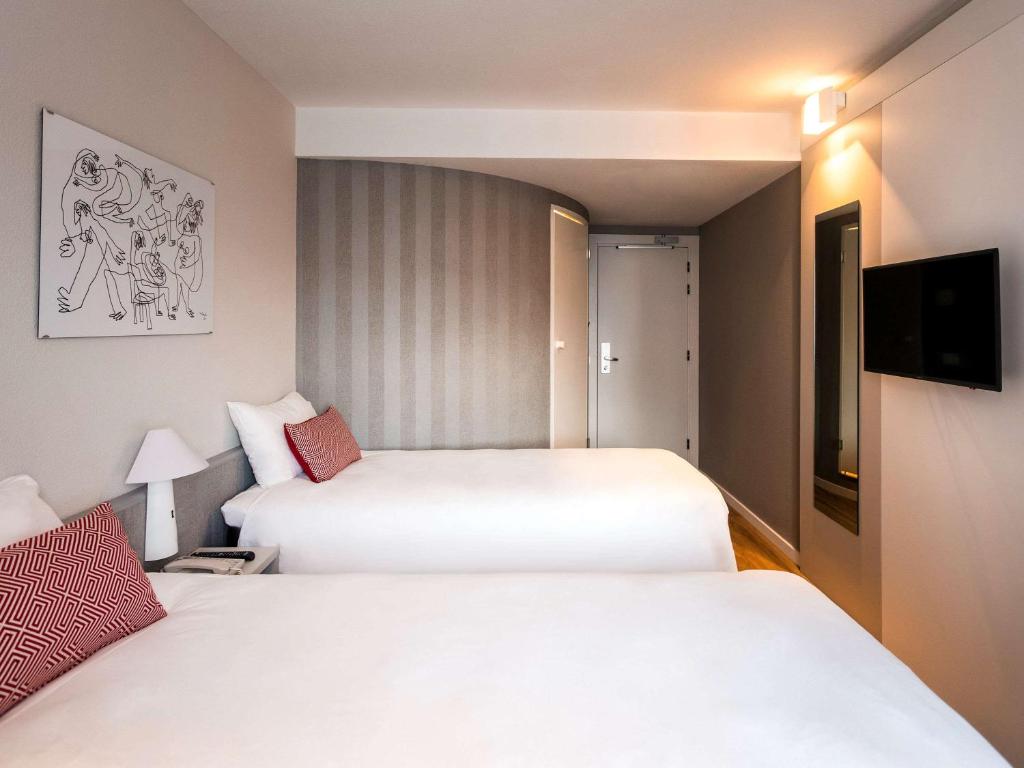 Postel nebo postele na pokoji v ubytování Ibis Valencia Alfafar