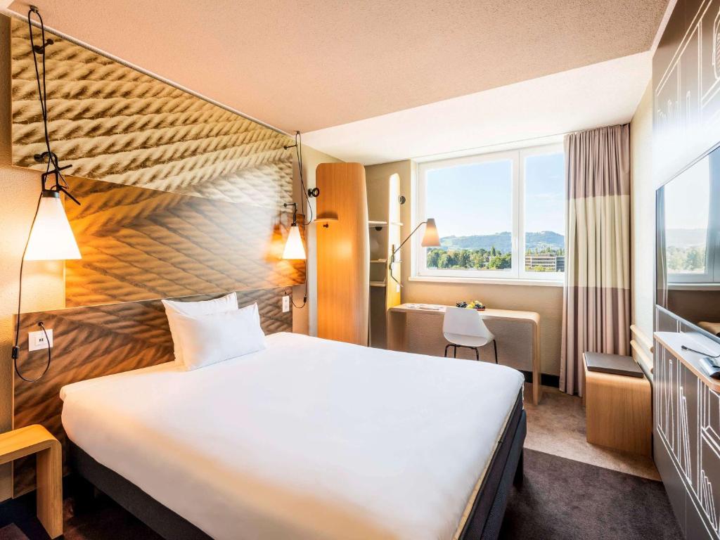 Llit o llits en una habitació de ibis Zürich City West