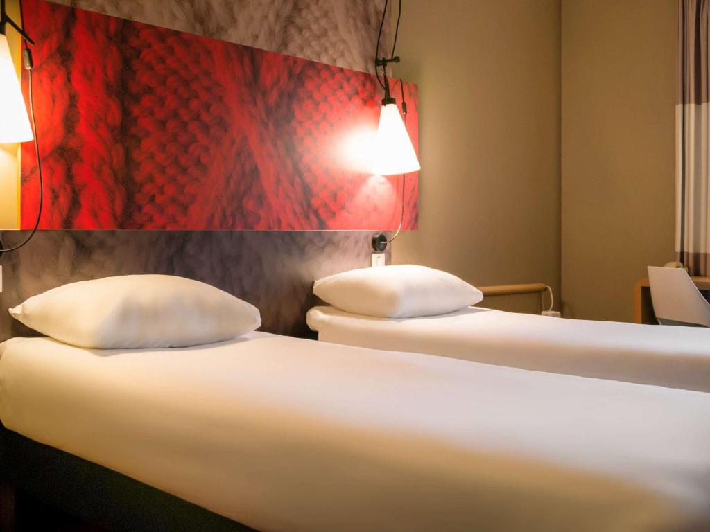 Llit o llits en una habitació de ibis Zürich City West