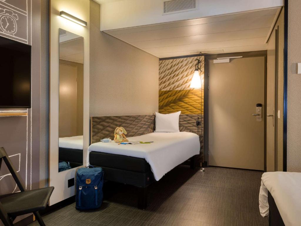 Llit o llits en una habitació de ibis Zürich City West