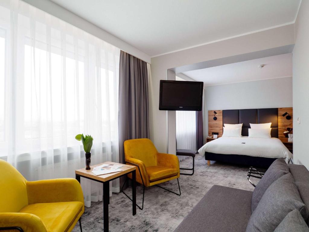 Posteľ alebo postele v izbe v ubytovaní Mercure Czestochowa Centrum