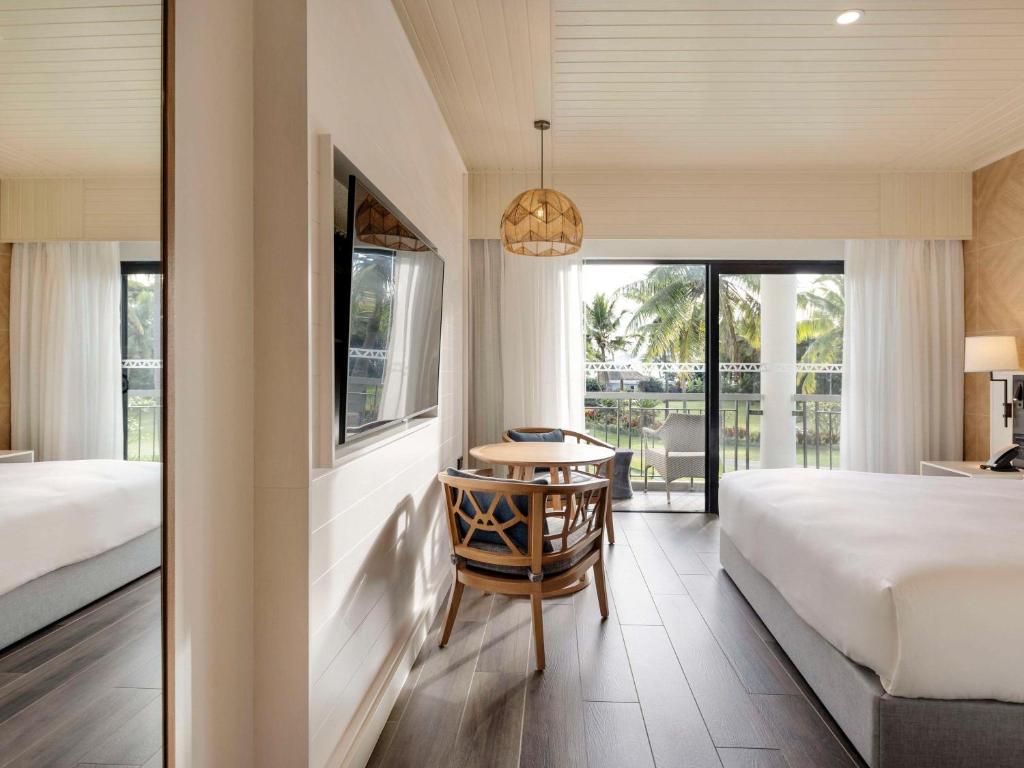 Postel nebo postele na pokoji v ubytování Sofitel Fiji Resort & Spa