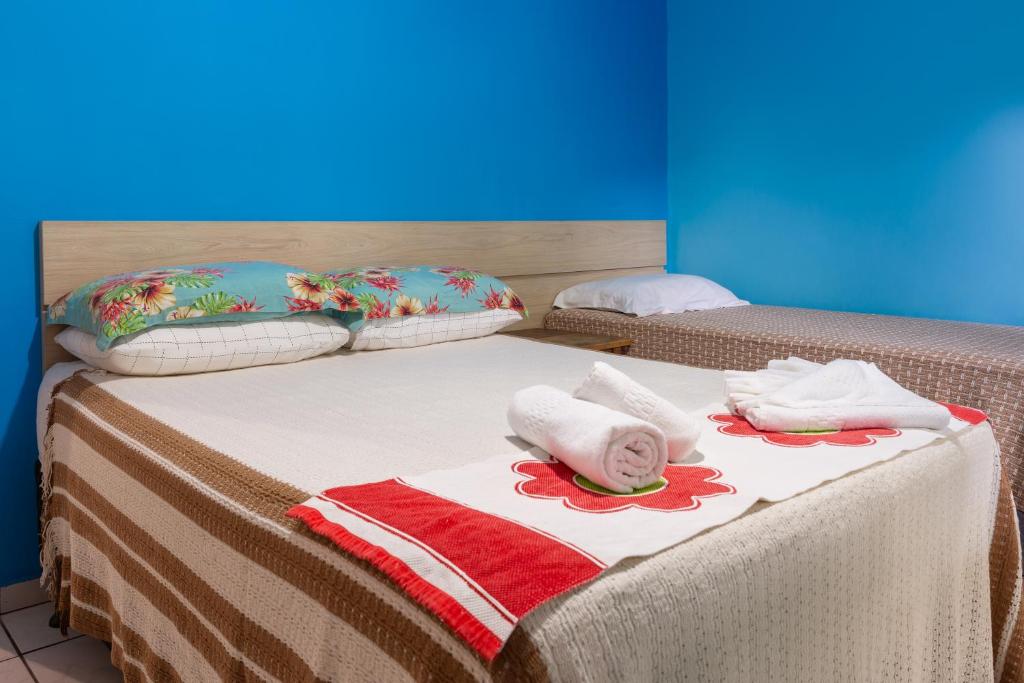 Cama ou camas em um quarto em Pousada Canto da Sereia