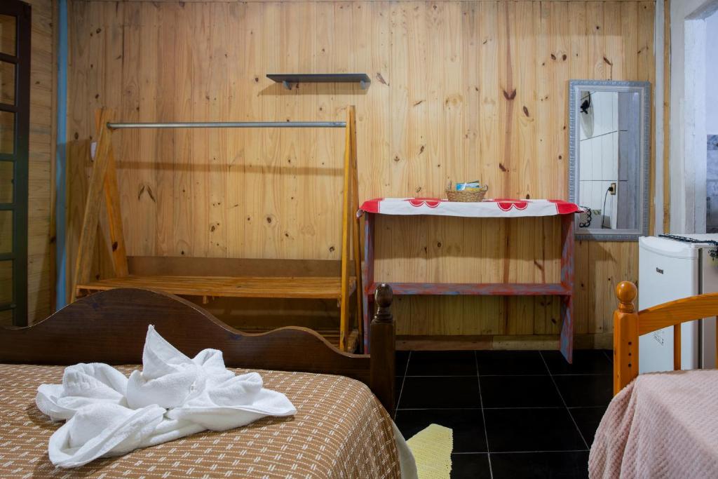 Cama ou camas em um quarto em Pousada Canto da Sereia