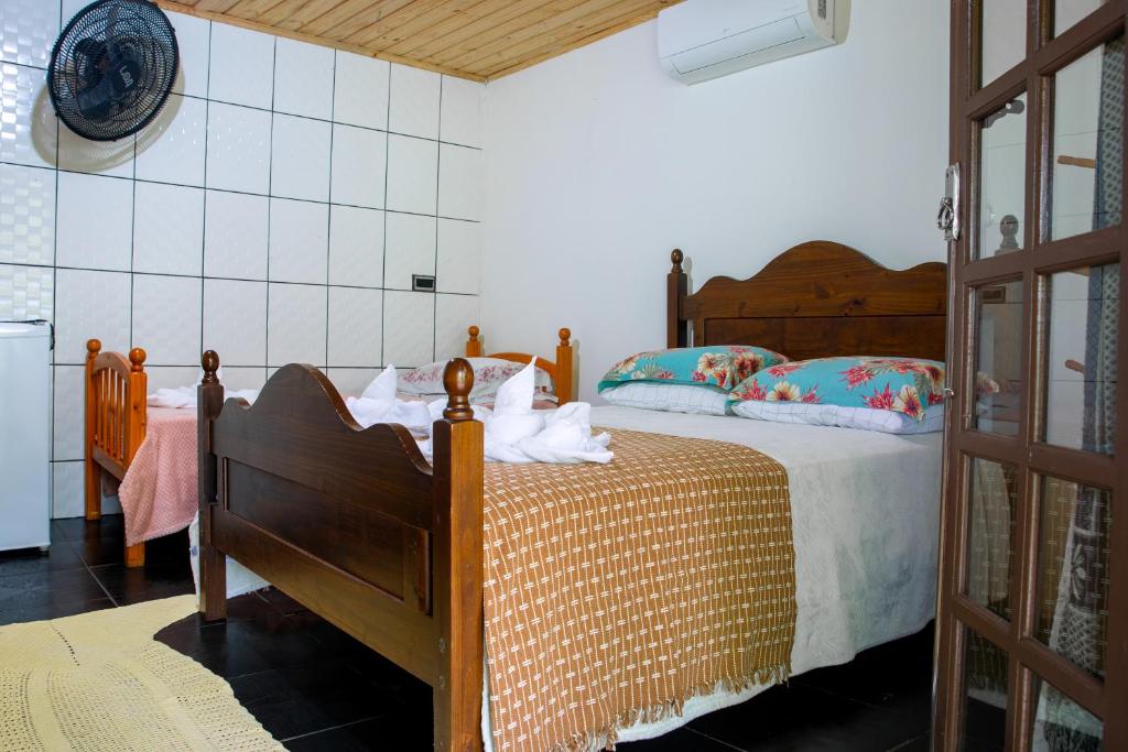 Cama ou camas em um quarto em Pousada Canto da Sereia