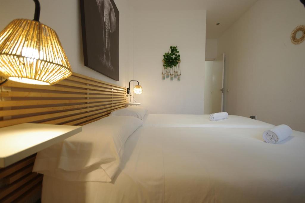 Postel nebo postele na pokoji v ubytování Livingtarifa Apartamento Agaporni