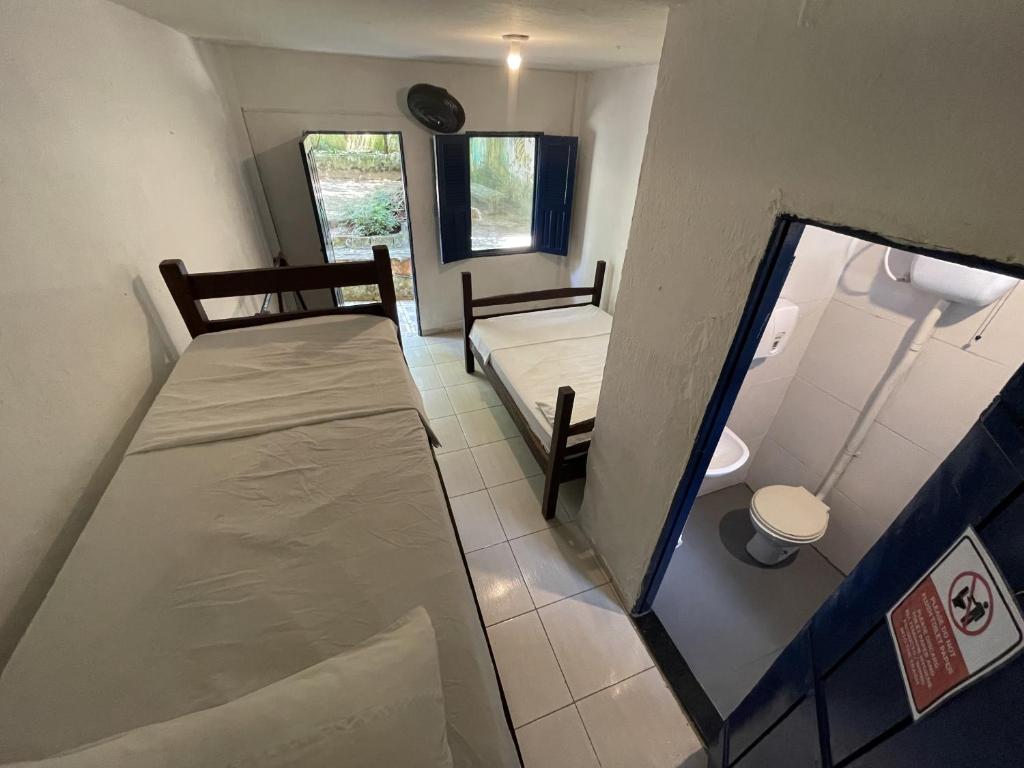 Postel nebo postele na pokoji v ubytování Ooxe Hostel