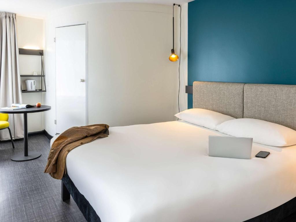 Postel nebo postele na pokoji v ubytování ibis Bristol Temple Meads