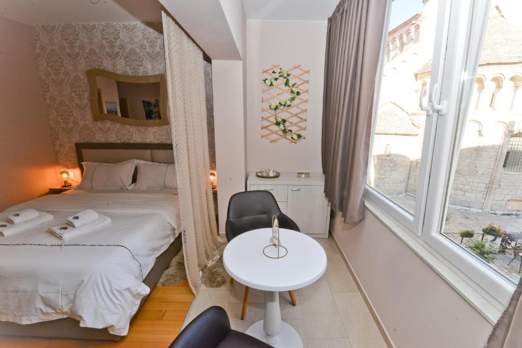 Postel nebo postele na pokoji v ubytování Zoilo Rooms self check-in