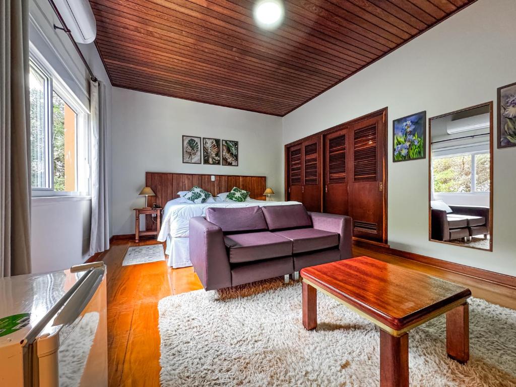 Postel nebo postele na pokoji v ubytování Pousada Victoria Villa By Nacional Inn - A 800 metros da Vila Capivari