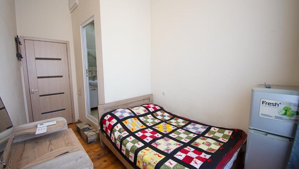 Postel nebo postele na pokoji v ubytování Guest House Natalia