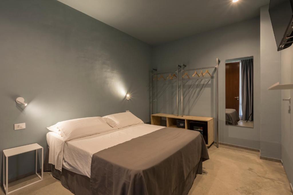 Postel nebo postele na pokoji v ubytování LELE' Guesthouse