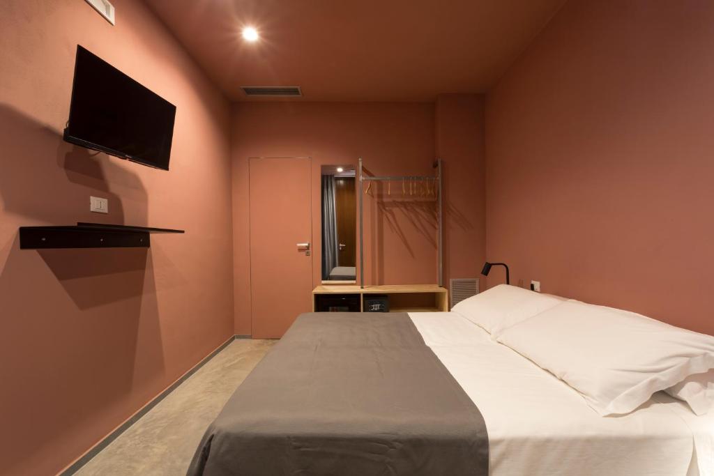 Postel nebo postele na pokoji v ubytování LELE' Guesthouse