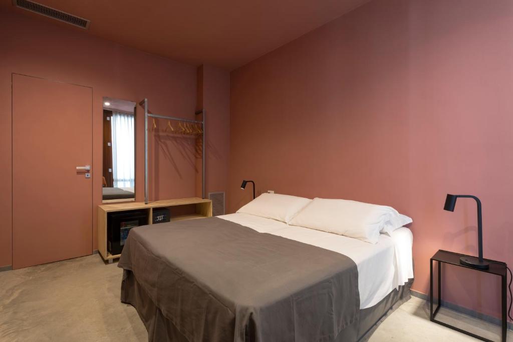 Postel nebo postele na pokoji v ubytování LELE' Guesthouse