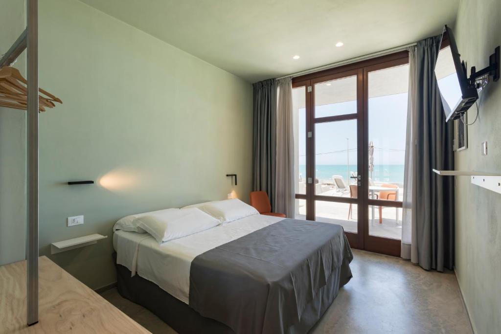 Postel nebo postele na pokoji v ubytování LELE' Guesthouse