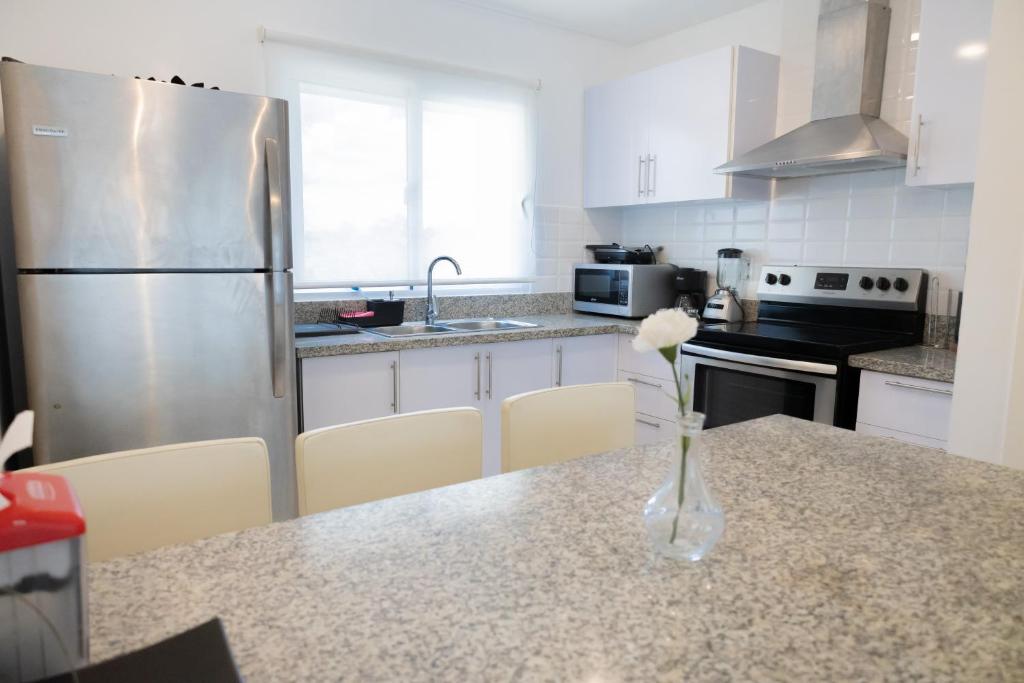 Kuchyň nebo kuchyňský kout v ubytování Ka' Romana Residences