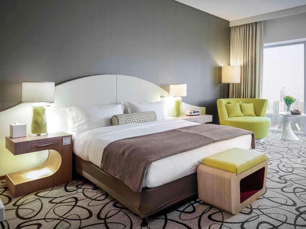 Postel nebo postele na pokoji v ubytování Sofitel Dubai Downtown