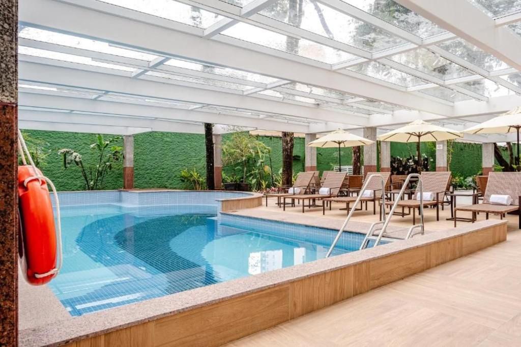Bazén v ubytování Apart Hotel Premium Verbo Divino Morumbi nebo v jeho okolí