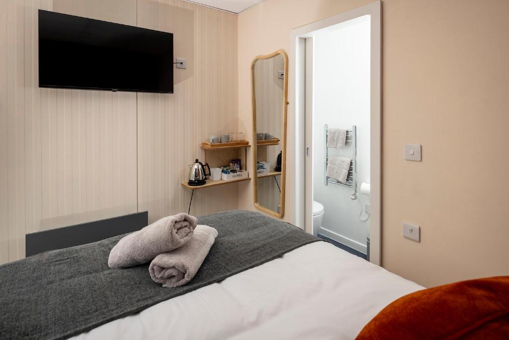 Postel nebo postele na pokoji v ubytování nodpod accomodation