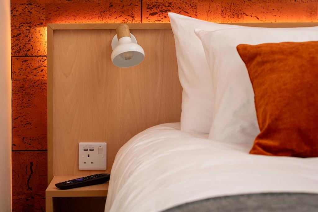 Postel nebo postele na pokoji v ubytování nodpod accomodation