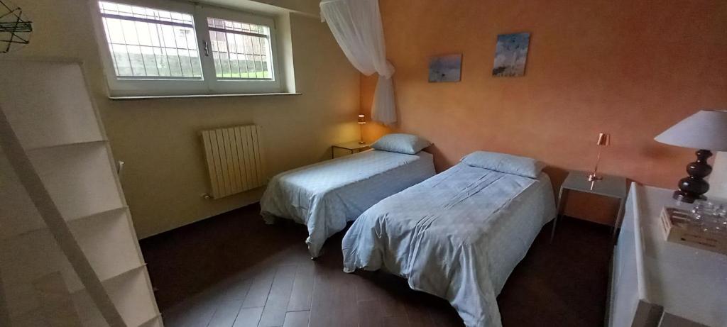 Letto o letti in una camera di Appartamento Sleep&Fly