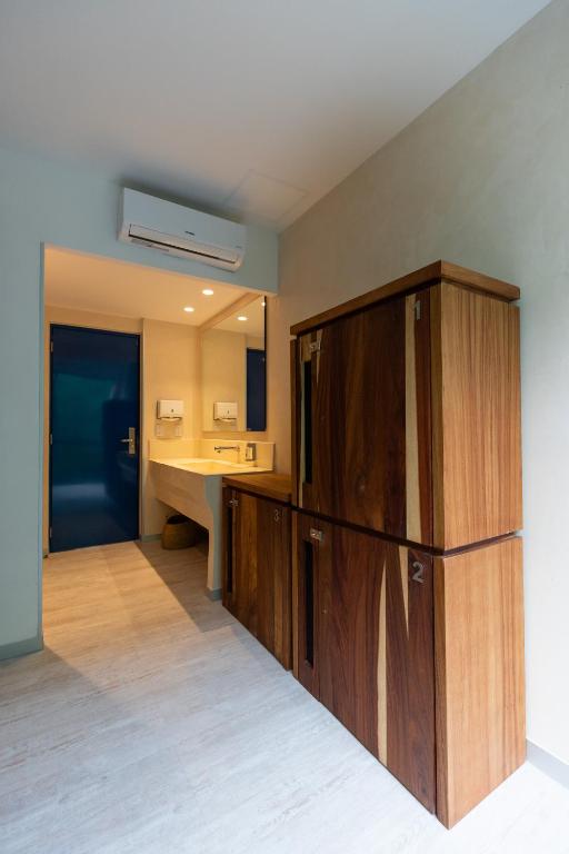 Kuchyň nebo kuchyňský kout v ubytování SUUT Hostal Boutique