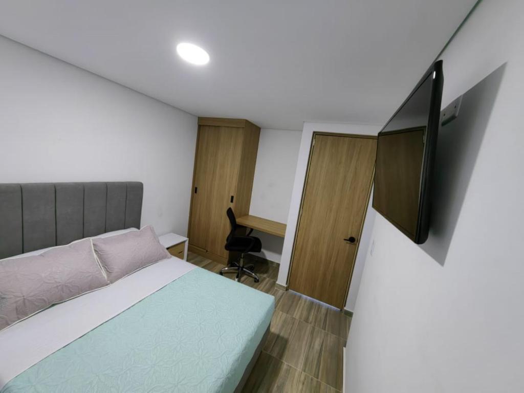 TV a/nebo společenská místnost v ubytování Moravia Coliving