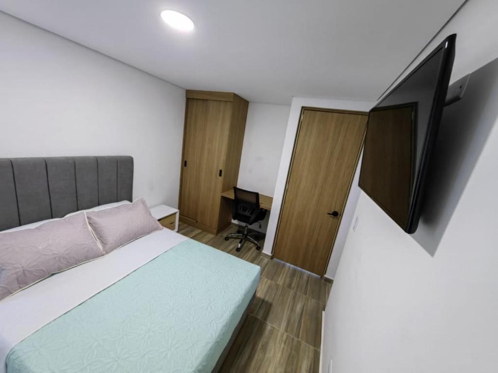 TV a/nebo společenská místnost v ubytování Moravia Coliving