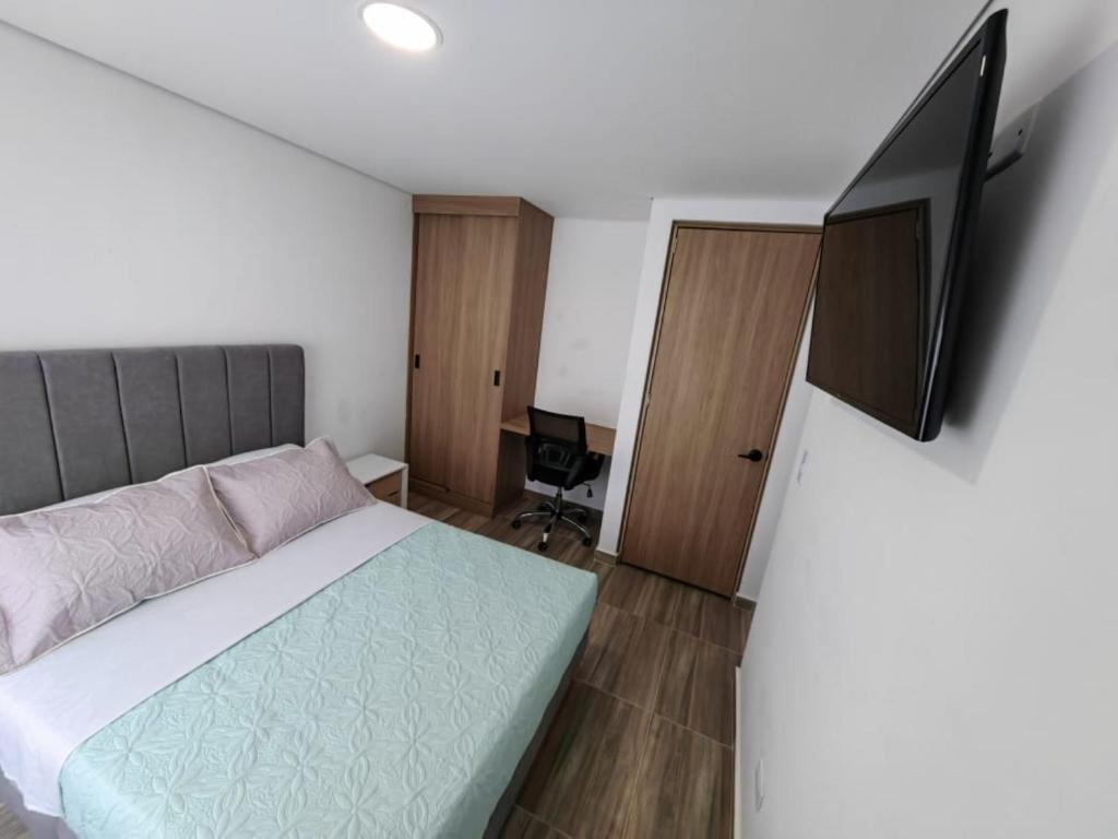 TV a/nebo společenská místnost v ubytování Moravia Coliving