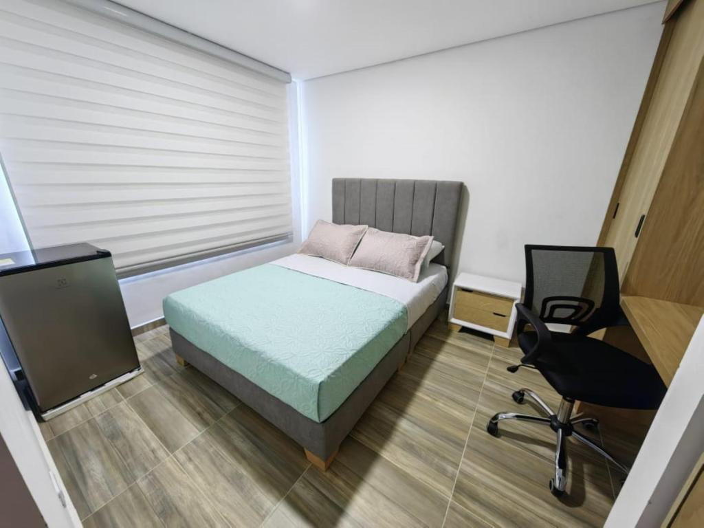 Postel nebo postele na pokoji v ubytování Moravia Coliving