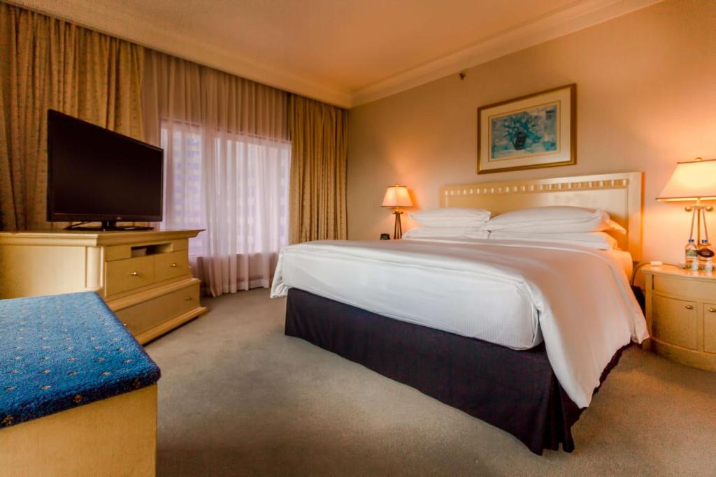 Postel nebo postele na pokoji v ubytování Hilton Colombo Hotel