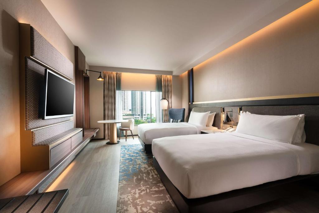 Postel nebo postele na pokoji v ubytování Hilton Colombo Hotel