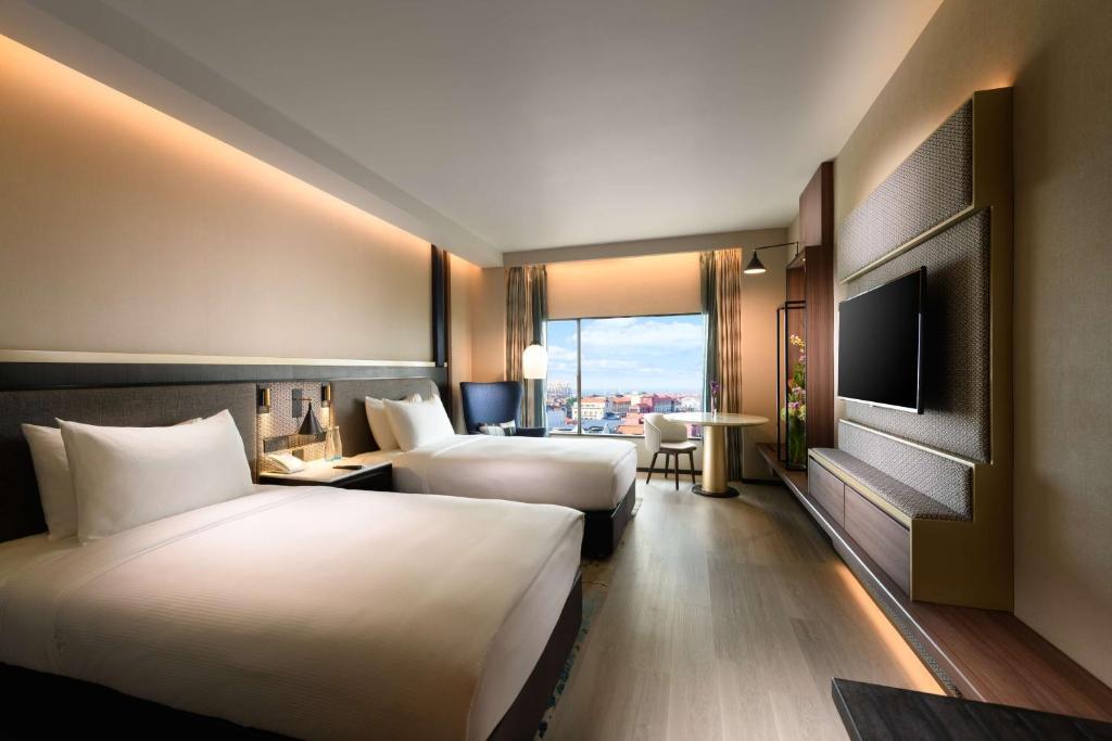 Postel nebo postele na pokoji v ubytování Hilton Colombo Hotel