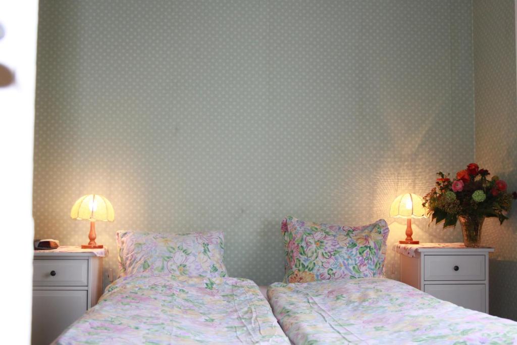 Postel nebo postele na pokoji v ubytování BasicRooms Hotel