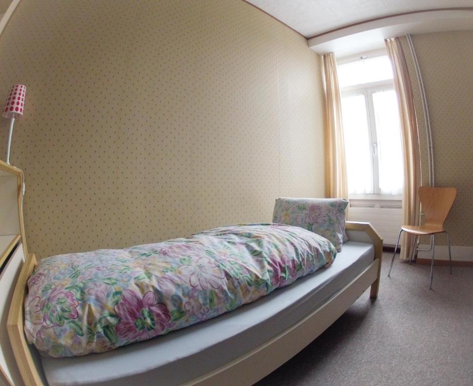 Postel nebo postele na pokoji v ubytování BasicRooms Hotel