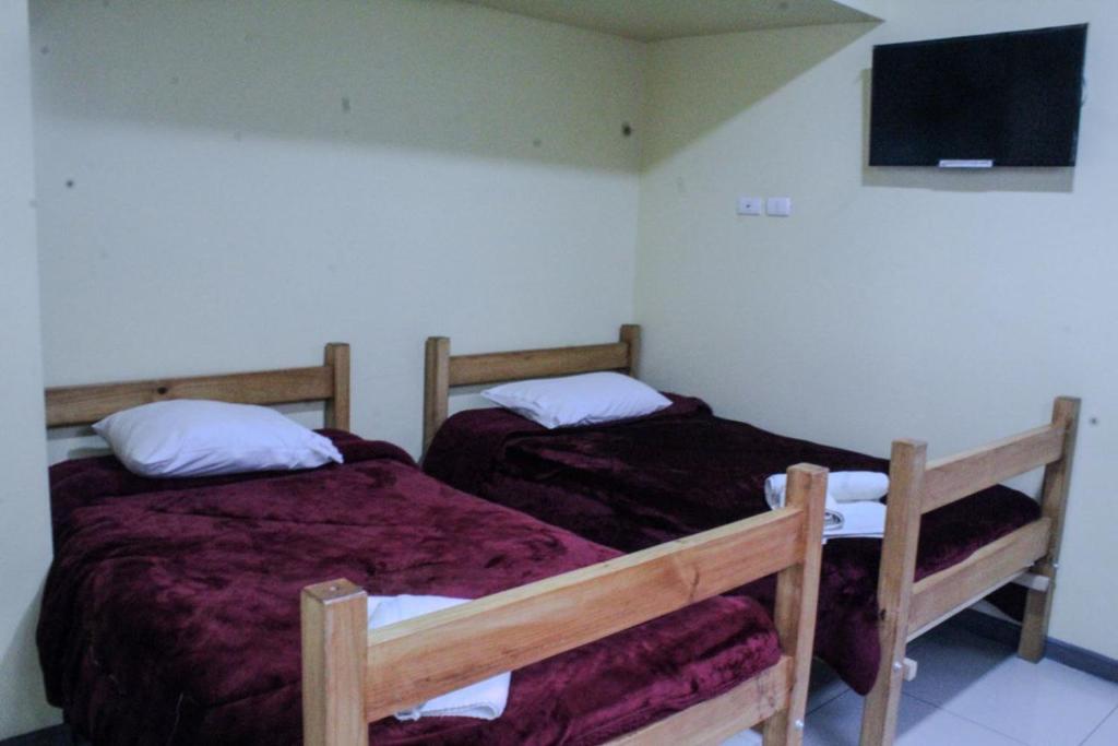 Postel nebo postele na pokoji v ubytování Hotel Blu Bascuñan