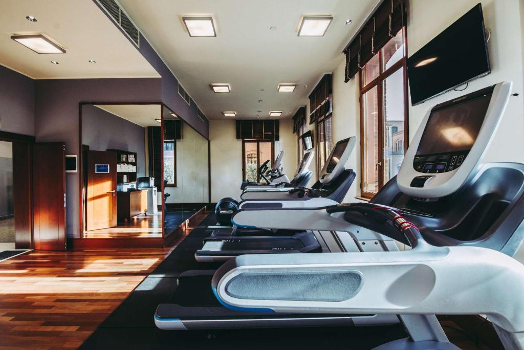a row of cardio machines in a gym at Hilton Molino Stucky Venice in Venice
