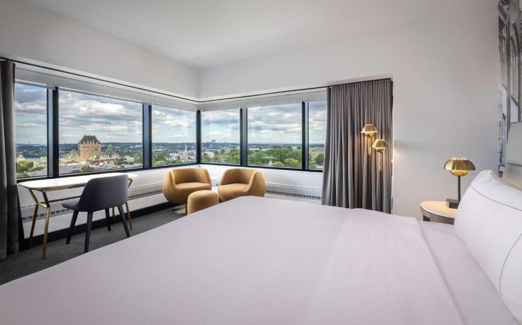 Postel nebo postele na pokoji v ubytování Hilton Quebec