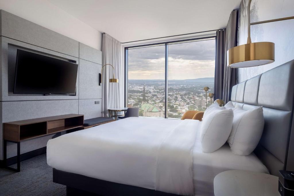 Postel nebo postele na pokoji v ubytování Hilton Quebec