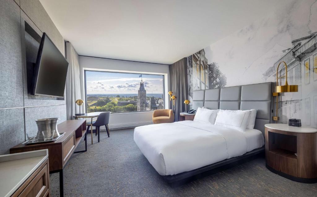 Postel nebo postele na pokoji v ubytování Hilton Quebec