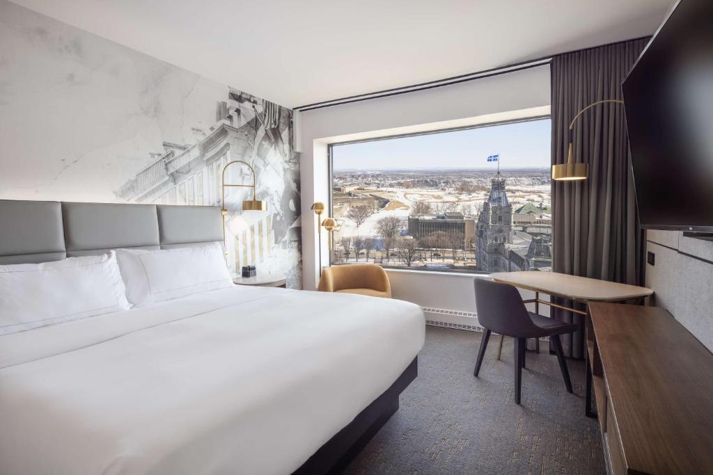 Postel nebo postele na pokoji v ubytování Hilton Quebec