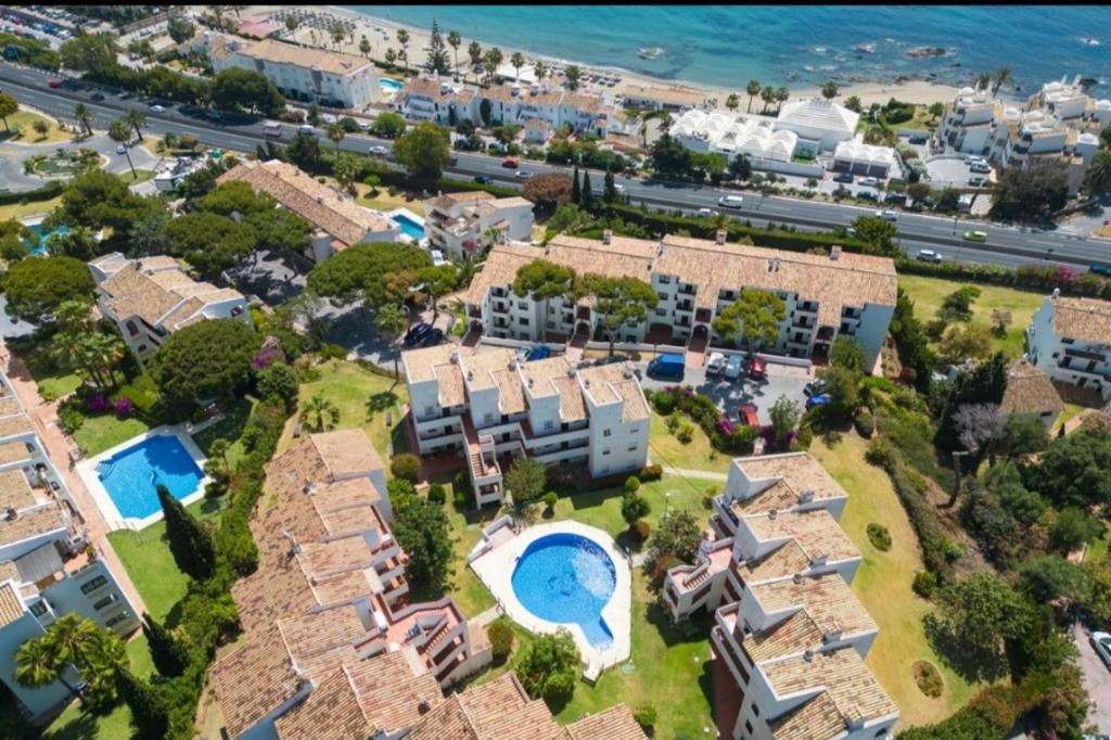 an aerial view of a villa with a swimming pool at La Cala playa in La Cala de Mijas