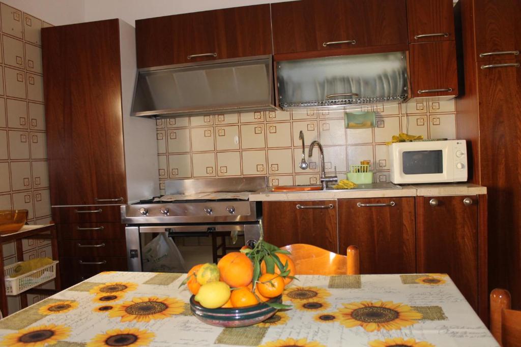Kuchyňa alebo kuchynka v ubytovaní Casa Mia, vacanze